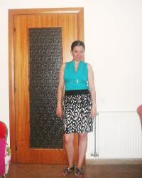 A Sleeveless Button-Down and a Printed Pencil Skirt.