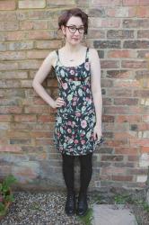 floral dress and hoop earrings