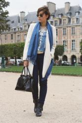 white coat and blue scarf