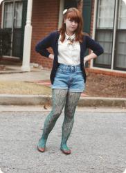 An Unseasonably Warm Shorts, Navy Cardigan, & Green Lace Tights Outfit