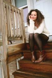 Huge hair + nubby sweater + leather shorts