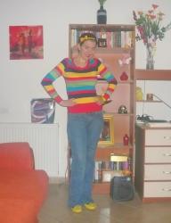 Rainbow Color-block Sweater with Jeans and Pops of Yellow.