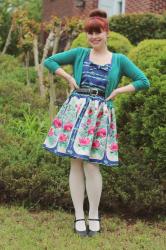 A Floral & Bow Print PepaLoves Dress, Teal Cardigan, & Top Knot