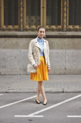 yellow skirt, blue shirt & white bag