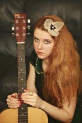 Green suede dress and guitar