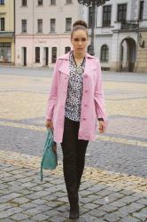 big bun and pink trench