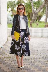 White jeweled sweatshirt, leaf print skirt