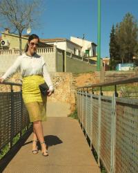 Yellow skirt with silver sandals