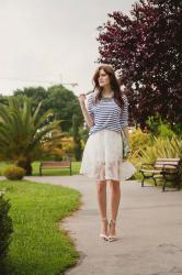 WHITE SKIRT AND LEMON CLUTCH