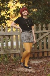 Outfit: Houndstooth Shorts, Black Short Sleeved Sweater, and Yellow Tights