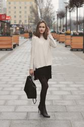 Fringe skirt and beige sweater