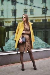 khaki dress with amber coat