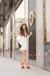 White dress and red sandals