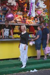 White trousers taking a walk at the fair