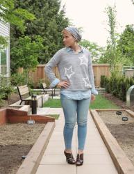 Star power:  denim-on-denim jeans and shirt, star-patterned sweater, leopard heels, and floral beanie