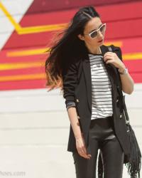 Look estilo Sporty Chic con Pantalones de cuero y Adidas Stan Smith Negras