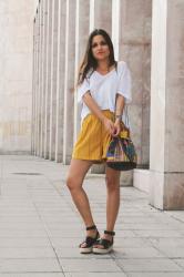 mustard shorts & beads bag