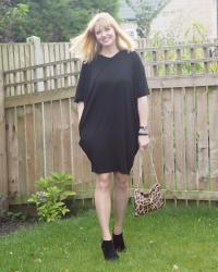 Black Cocoon Pocket dress, Ankle Boots and Printed Tights