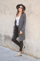 Grey cardigan, grey hat 