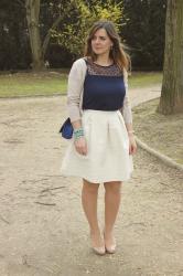 Blue top and cream skirt