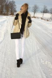 Faux fur and white pants