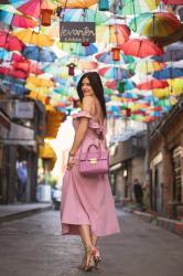 PINK DRESS AND UMBRELLAS 