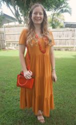 Orange Dresses and Red Accessories