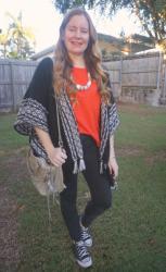 Red Tees and Black Cardigans With Skinny Jeans